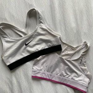 white nike and reebok sports bras